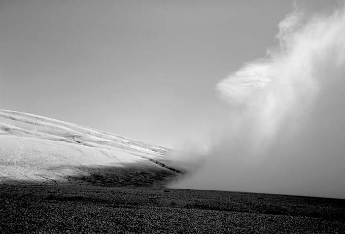 A stationary fog bank on the northeast flank of Broken Mountain, 2004. (© Gary Freeburg)